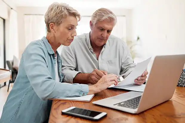 an old couple doing financial planning